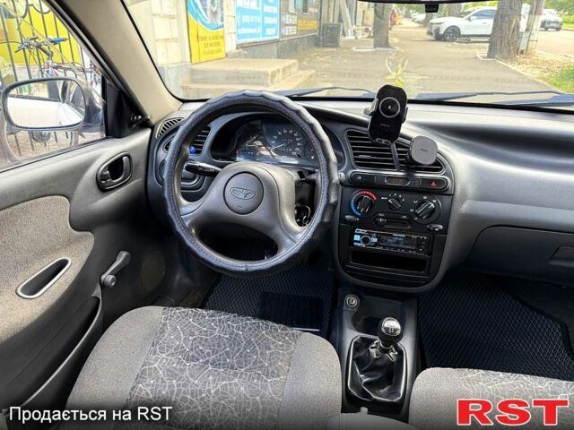 Дэу Ланос, объемом двигателя 1.5 л и пробегом 230 тыс. км за 2399 $, фото 5 на Automoto.ua