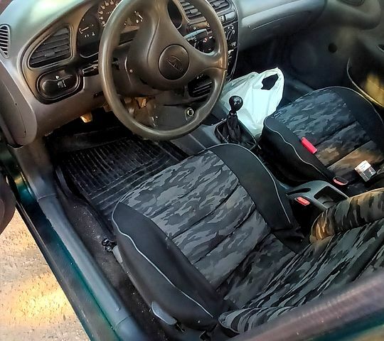 Дэу Ланос, объемом двигателя 14 л и пробегом 185 тыс. км за 1400 $, фото 4 на Automoto.ua