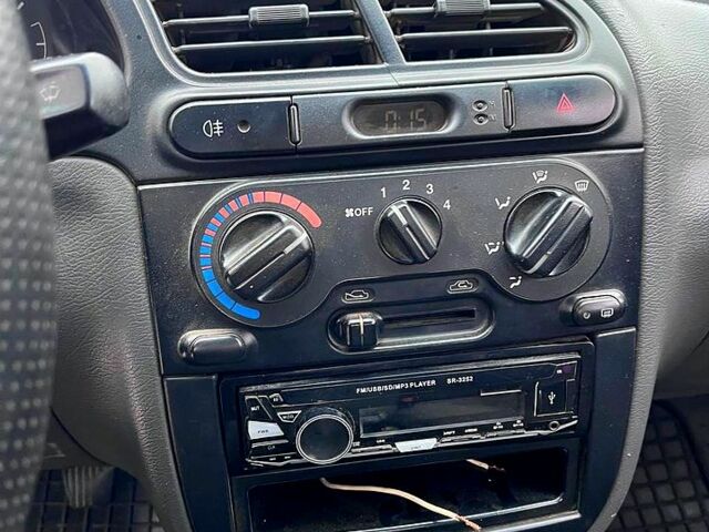 Дэу Ланос, объемом двигателя 1.4 л и пробегом 200 тыс. км за 1350 $, фото 4 на Automoto.ua