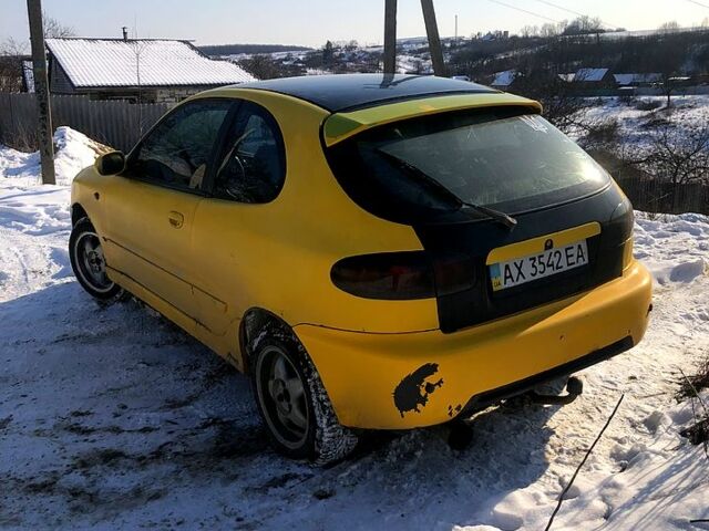 Жовтий Деу Ланос, об'ємом двигуна 1.6 л та пробігом 268 тис. км за 2000 $, фото 3 на Automoto.ua