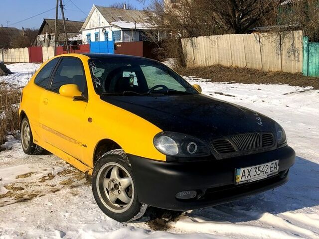 Жовтий Деу Ланос, об'ємом двигуна 1.6 л та пробігом 268 тис. км за 2000 $, фото 1 на Automoto.ua