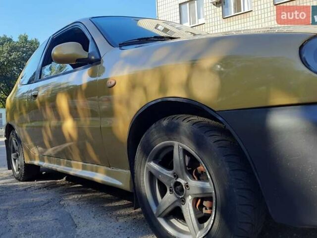 Дэу Ланос 2003 в Запорожье на Automoto.ua Желтый Дэу Ланос, объемом двигателя 1.6 л и пробегом 243 тыс. км за 1700 $, фото 4 на Automoto.ua