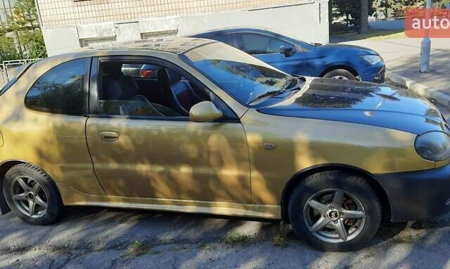 Дэу Ланос 2003 в Запорожье на Automoto.ua Желтый Дэу Ланос, объемом двигателя 1.6 л и пробегом 243 тыс. км за 1700 $, фото 3 на Automoto.ua