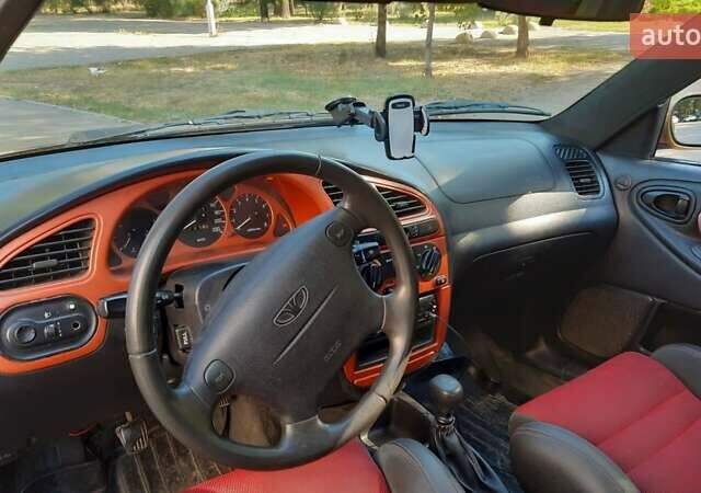 Дэу Ланос 2003 в Запорожье на Automoto.ua Желтый Дэу Ланос, объемом двигателя 1.6 л и пробегом 243 тыс. км за 1700 $, фото 7 на Automoto.ua