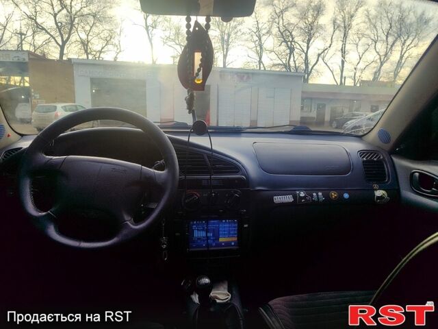 Жовтий Деу Ланос, об'ємом двигуна 1.5 л та пробігом 333 тис. км за 1500 $, фото 4 на Automoto.ua