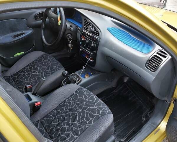 Желтый Дэу Ланос, объемом двигателя 1.5 л и пробегом 170 тыс. км за 2300 $, фото 25 на Automoto.ua