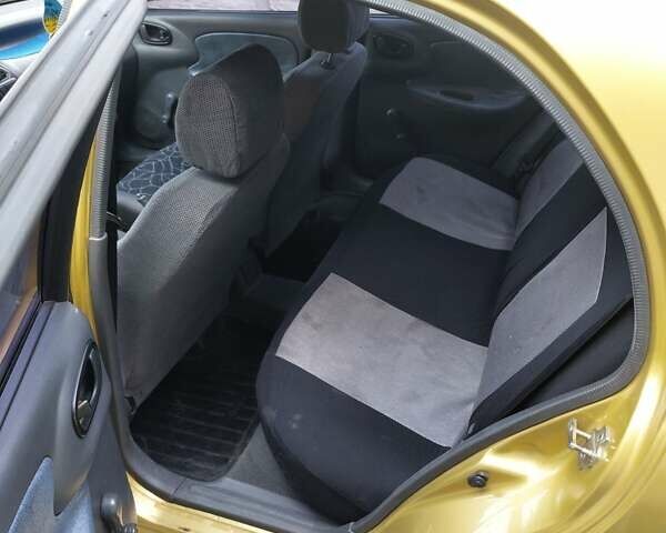 Желтый Дэу Ланос, объемом двигателя 1.5 л и пробегом 170 тыс. км за 2300 $, фото 3 на Automoto.ua