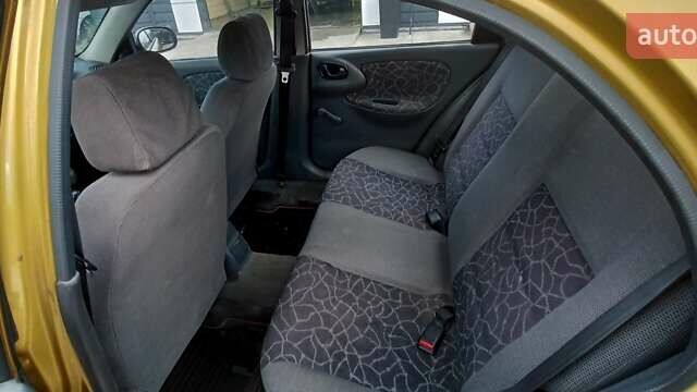 Дэу Ланос 2002 в Киеве на Automoto.ua Желтый Дэу Ланос, объемом двигателя 1.5 л и пробегом 273 тыс. км за 2100 $, фото 2 на Automoto.ua