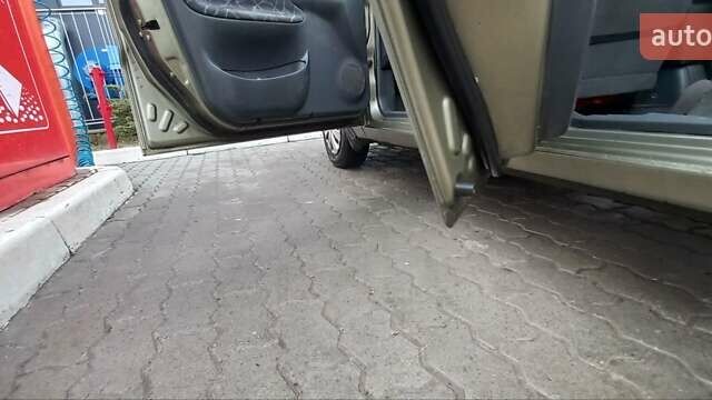 Желтый Дэу Ланос, объемом двигателя 1.5 л и пробегом 201 тыс. км за 1800 $, фото 1 на Automoto.ua