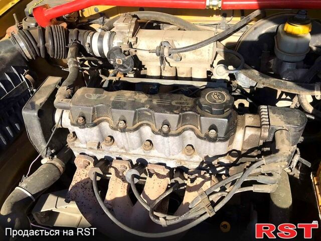 Дэу Ланос 2002 в Днепре (Днепропетровске) на Automoto.ua Желтый Дэу Ланос, объемом двигателя 1.5 л и пробегом 113 тыс. км за 1100 $, фото 5 на Automoto.ua