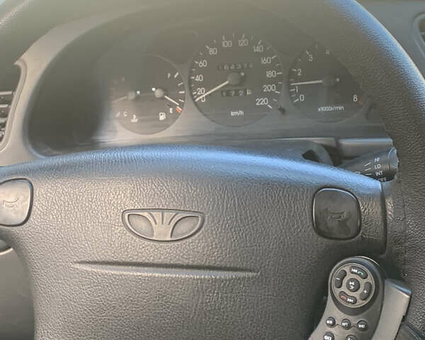 Жовтий Деу Ланос, об'ємом двигуна 1.6 л та пробігом 164 тис. км за 2400 $, фото 6 на Automoto.ua