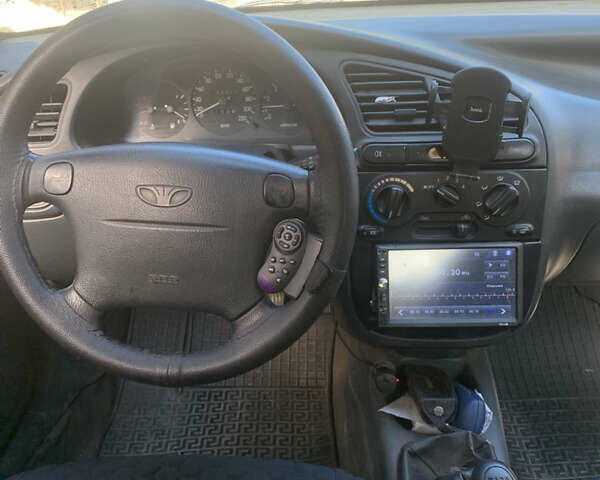 Жовтий Деу Ланос, об'ємом двигуна 1.6 л та пробігом 164 тис. км за 2400 $, фото 7 на Automoto.ua