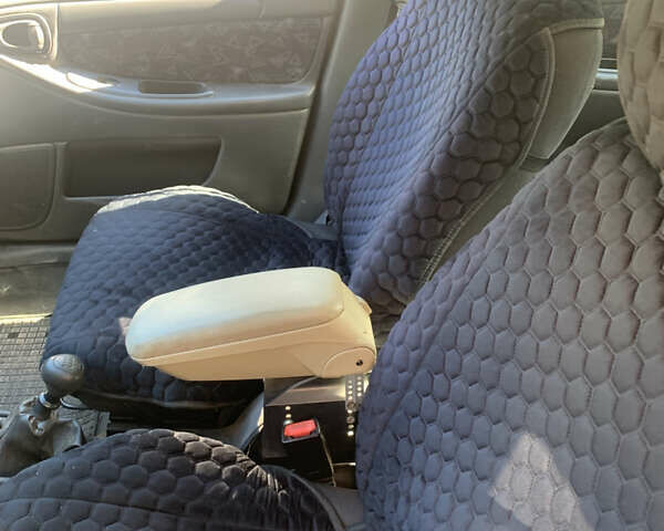 Жовтий Деу Ланос, об'ємом двигуна 1.6 л та пробігом 164 тис. км за 2400 $, фото 8 на Automoto.ua