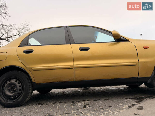 Желтый Дэу Ланос, объемом двигателя 1.5 л и пробегом 167 тыс. км за 2300 $, фото 6 на Automoto.ua