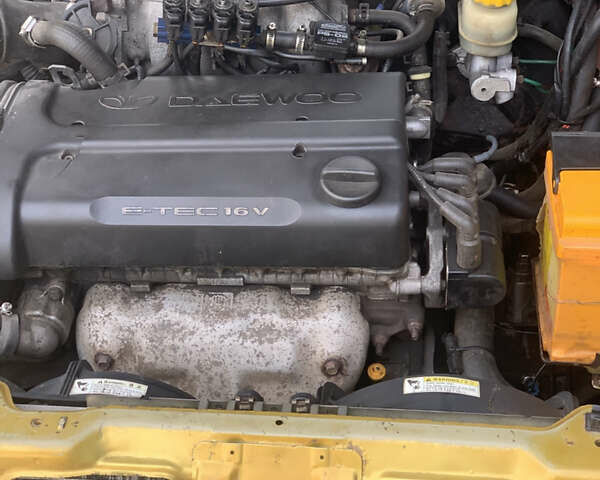 Жовтий Деу Ланос, об'ємом двигуна 1.6 л та пробігом 164 тис. км за 2400 $, фото 5 на Automoto.ua