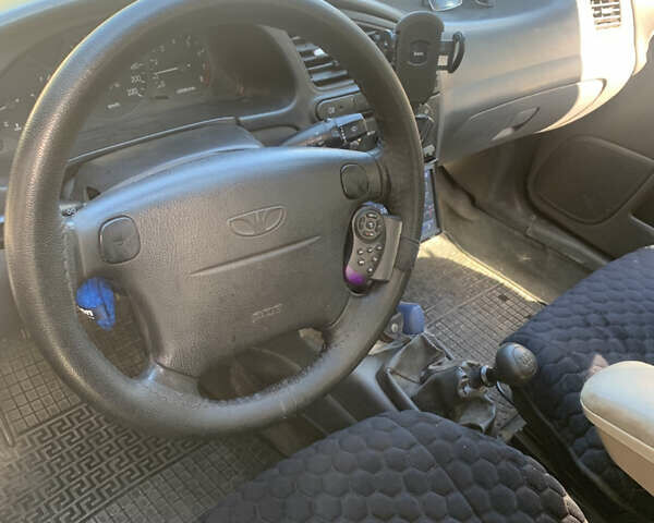 Жовтий Деу Ланос, об'ємом двигуна 1.6 л та пробігом 164 тис. км за 2400 $, фото 2 на Automoto.ua