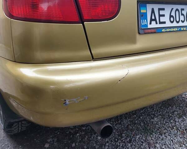 Желтый Дэу Ланос, объемом двигателя 1.5 л и пробегом 170 тыс. км за 2300 $, фото 6 на Automoto.ua