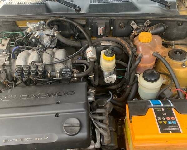 Жовтий Деу Ланос, об'ємом двигуна 1.6 л та пробігом 164 тис. км за 2400 $, фото 1 на Automoto.ua