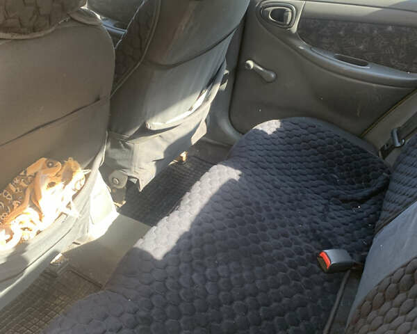 Жовтий Деу Ланос, об'ємом двигуна 1.6 л та пробігом 164 тис. км за 2400 $, фото 3 на Automoto.ua