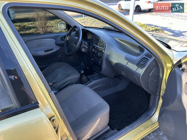 Жовтий Деу Ланос, об'ємом двигуна 1.5 л та пробігом 268 тис. км за 1800 $, фото 9 на Automoto.ua