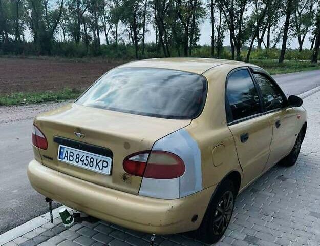 Желтый Дэу Ланос, объемом двигателя 1.3 л и пробегом 200 тыс. км за 1400 $, фото 1 на Automoto.ua
