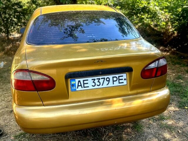 Желтый Дэу Ланос, объемом двигателя 1.5 л и пробегом 200 тыс. км за 1500 $, фото 2 на Automoto.ua