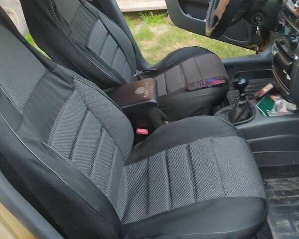 Желтый Дэу Ланос, объемом двигателя 1.6 л и пробегом 265 тыс. км за 2850 $, фото 11 на Automoto.ua