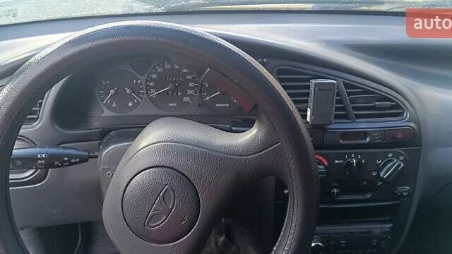 Желтый Дэу Ланос, объемом двигателя 1.5 л и пробегом 272 тыс. км за 2000 $, фото 10 на Automoto.ua