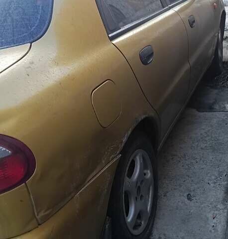 Желтый Дэу Ланос, объемом двигателя 1.5 л и пробегом 272 тыс. км за 2000 $, фото 5 на Automoto.ua