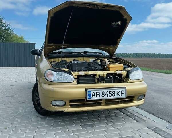 Желтый Дэу Ланос, объемом двигателя 1.3 л и пробегом 200 тыс. км за 1400 $, фото 6 на Automoto.ua