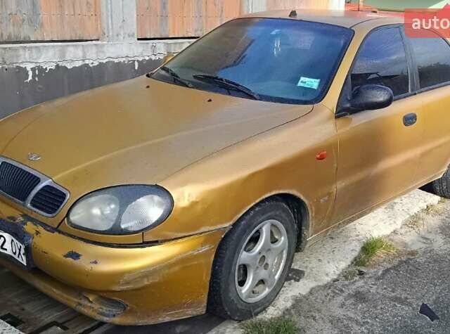 Желтый Дэу Ланос, объемом двигателя 1.5 л и пробегом 272 тыс. км за 2000 $, фото 4 на Automoto.ua