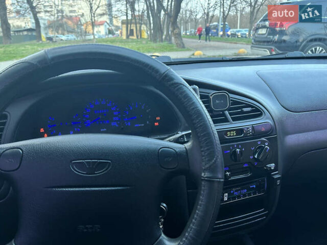 Желтый Дэу Ланос, объемом двигателя 1.6 л и пробегом 240 тыс. км за 2700 $, фото 16 на Automoto.ua