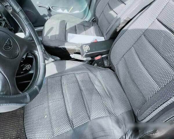 Желтый Дэу Ланос, объемом двигателя 1.3 л и пробегом 200 тыс. км за 1400 $, фото 9 на Automoto.ua