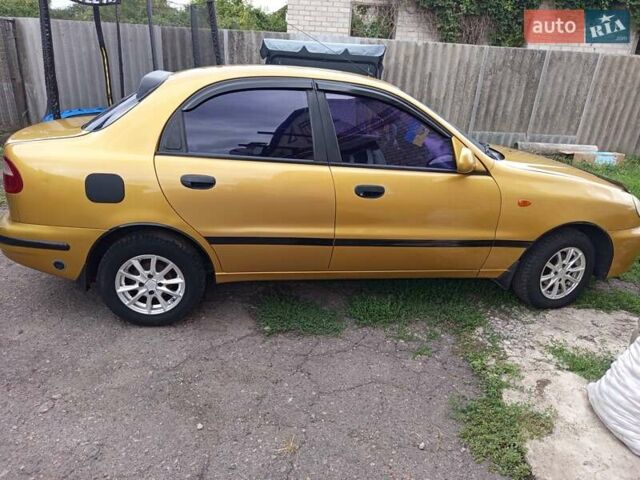 Желтый Дэу Ланос, объемом двигателя 1.3 л и пробегом 245 тыс. км за 2550 $, фото 4 на Automoto.ua