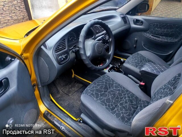 Желтый Дэу Ланос, объемом двигателя 1.5 л и пробегом 203 тыс. км за 2500 $, фото 3 на Automoto.ua