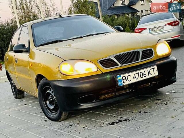 Желтый Дэу Ланос, объемом двигателя 1.3 л и пробегом 240 тыс. км за 750 $, фото 1 на Automoto.ua