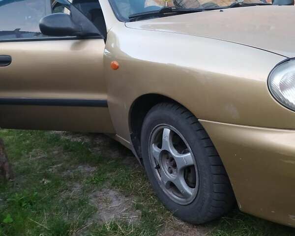 Желтый Дэу Ланос, объемом двигателя 1.6 л и пробегом 265 тыс. км за 2850 $, фото 8 на Automoto.ua