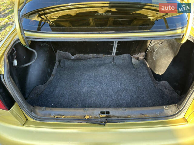 Жовтий Деу Ланос, об'ємом двигуна 1.5 л та пробігом 268 тис. км за 1800 $, фото 12 на Automoto.ua