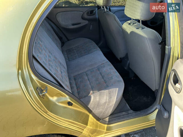 Жовтий Деу Ланос, об'ємом двигуна 1.5 л та пробігом 268 тис. км за 1800 $, фото 11 на Automoto.ua