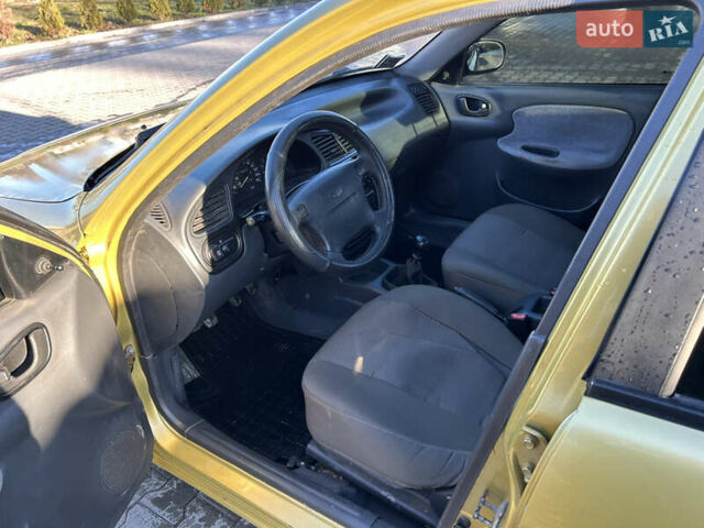 Жовтий Деу Ланос, об'ємом двигуна 1.5 л та пробігом 268 тис. км за 1800 $, фото 8 на Automoto.ua