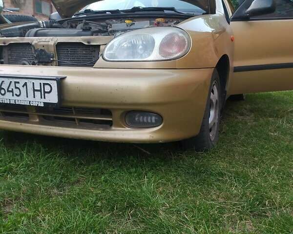 Желтый Дэу Ланос, объемом двигателя 1.6 л и пробегом 265 тыс. км за 2850 $, фото 7 на Automoto.ua