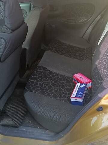 Желтый Дэу Ланос, объемом двигателя 1.5 л и пробегом 272 тыс. км за 2000 $, фото 8 на Automoto.ua