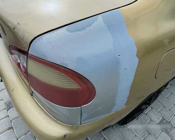 Желтый Дэу Ланос, объемом двигателя 1.3 л и пробегом 200 тыс. км за 1400 $, фото 2 на Automoto.ua