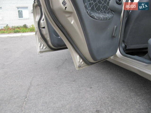 Дэу Ланос 2004 в Днепре (Днепропетровске) на Automoto.ua Желтый Дэу Ланос, объемом двигателя 1.5 л и пробегом 147 тыс. км за 3500 $, фото 11 на Automoto.ua