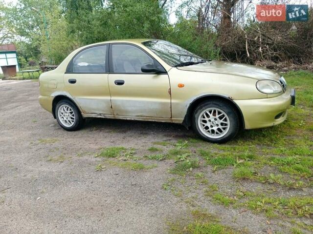 Желтый Дэу Ланос, объемом двигателя 1.5 л и пробегом 215 тыс. км за 1100 $, фото 4 на Automoto.ua
