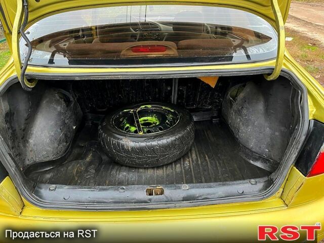 Жовтий Деу Ланос, об'ємом двигуна 1.5 л та пробігом 300 тис. км за 1000 $, фото 6 на Automoto.ua
