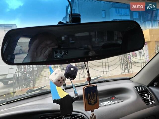 Желтый Дэу Ланос, объемом двигателя 1.5 л и пробегом 205 тыс. км за 1600 $, фото 12 на Automoto.ua