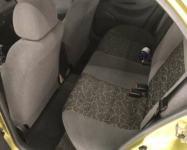 Жовтий Деу Ланос, об'ємом двигуна 1.4 л та пробігом 120 тис. км за 2999 $, фото 10 на Automoto.ua
