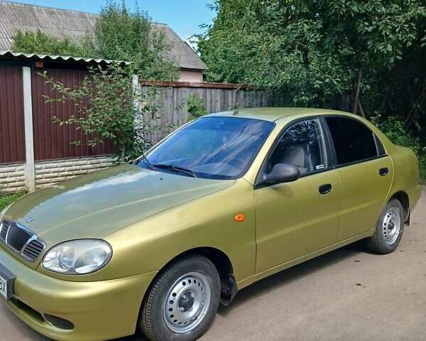 Желтый Дэу Ланос, объемом двигателя 1.39 л и пробегом 105 тыс. км за 2650 $, фото 7 на Automoto.ua