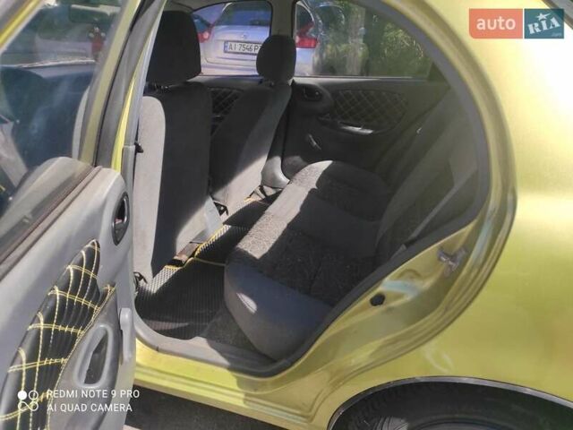 Жовтий Деу Ланос, об'ємом двигуна 1.5 л та пробігом 245 тис. км за 2300 $, фото 1 на Automoto.ua